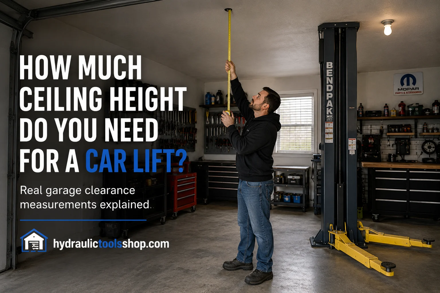 Mechanic measuring garage ceiling height for car lift installation